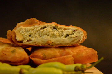 Martabak Tahu or  Tofu Martabak which is filled with chopped vegetables, spring onions, tofu and eggs. Indonesian traditional food.