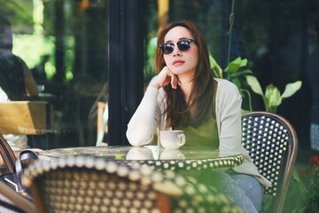 woman sitting in a cafe