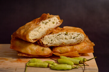 Martabak Tahu or  Tofu Martabak which is filled with chopped vegetables, spring onions, tofu and eggs. Indonesian traditional food.