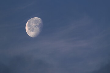 Naklejka na ściany i meble Moon in the sky with clouds. 