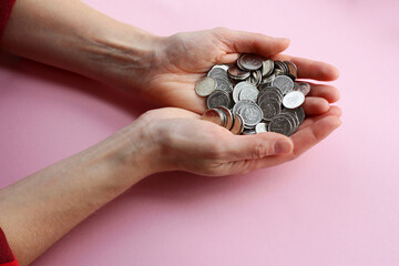 a lot of coins in the hands, russian ruble, counting money, economy concept, allocation of money,...