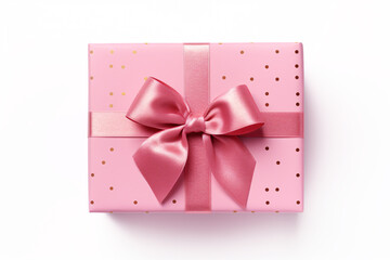 Top view of pink gift box with ribbon and golden dots on white background