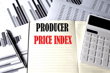PRODUCER PRICE INDEX text written on a notebook on chart and diagram
