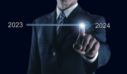 Businessman touch on business virtual bar from 2023 to 2024