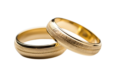Two golden wedding rings isolated on transparent background. PNG file, cut out