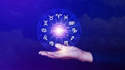 Concept of astrology and horoscope, person inside a zodiac sign wheel, Astrological zodiac signs inside of horoscope circle, Astrology, knowledge of stars in the sky, power of the universe concept.