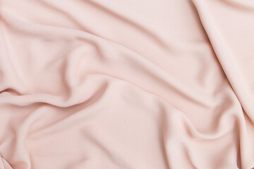 Closeup waving pink fabric background, blank pink fabric texture background