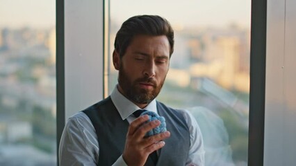 Corporate businessman thinking ideas tossing ball in panoramic office closeup - Powered by Adobe