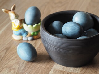 Painted Easter eggs with Easter bunny. Easter table decoration. Christian spring festival 