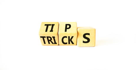 Tips and tricks symbol. Turned wooden cubes and changed the word tricks to tips. Beautiful white...