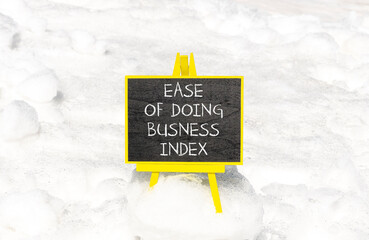 Ease of doing business index symbol. Concept words Ease of doing business index on beautiful blackboard. Beautiful snow background. Business, ease of doing business index concept. Copy space.