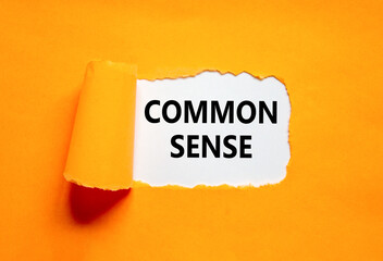 Common sense symbol. Concept words Common sense on beautiful white paper. Beautiful orange table orange background. Business, motivational common sense concept. Copy space.