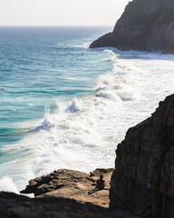 waves crashing on rocks