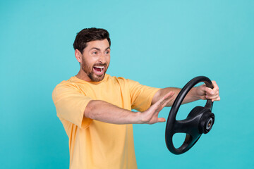 Photo of aggressive young man wearing yellow t shirt holding steering wheel beep when see front car...