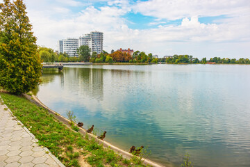 Lake in Ivano-Frankivsk city (Ukraine) on a summer day, a famous vacation spot on the shore and on...