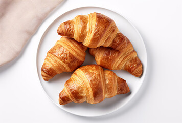 croissants and pastry on white plate top view for use on product with white backgorund