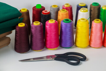 Cotton multicolor thread spools for sewing machine.