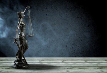 No law concept.  Bronze Statue of Justice in smoke - obrazy, fototapety, plakaty