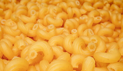 close up of a pile of italian pasta cavatappi