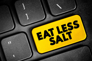 Fototapeta premium Eat Less Salt text button on keyboard, health concept background