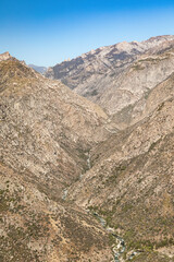 Steep canyon walls leading to the South Fork Kings River below in Kings Canyon National Park California during summer. 
