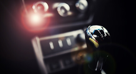 Manual gearbox. Car interior details. Car transmission. Soft lighting. Abstract view