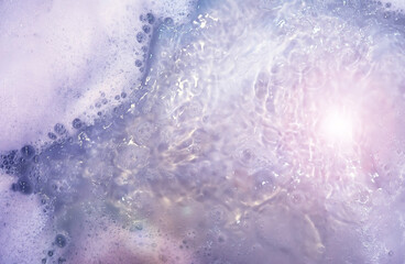 foam blue texture soap bubbles on the water abstract background