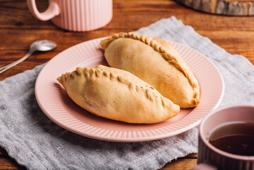 Oven Baked Cabbage Pies on Plate.