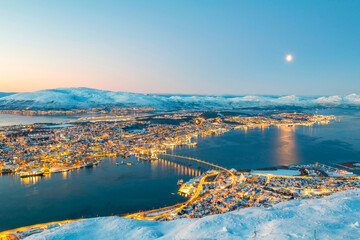 Norway- Troms og Finnmark- Tromso- long exposure of illuminated city seen from Fjellheisen at sunset - obrazy, fototapety, plakaty