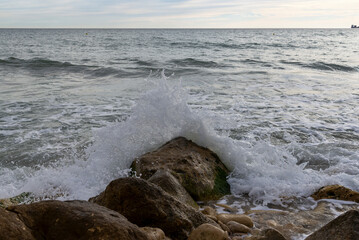 Fototapeta premium Mediterranean sea waves. Waves crashing on rocks