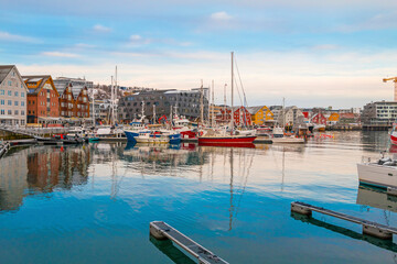 View of a marina and harbor in Tromso, North Norway. Tromso is considered the northernmost city in...