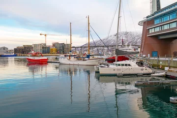 Foto op Plexiglas View of a marina and harbor in Tromso, North Norway. Tromso is considered the northernmost city in the world with a population above 50,000 © johnkruger1