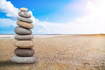 Stone Natural pebble tower on the beach.