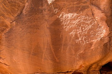 Rock art, petroglyph from the Neolithic period, depictions of giraffes, Bouhadian rocks in Tadrart...