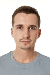 Fototapeta premium handsome young calm man on white background