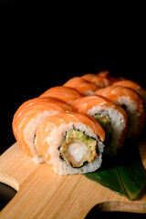 Portion of philadelphia salmon sushi rolls with cream cheese