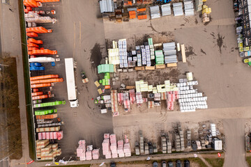 Drone photography of construction material outdoor shop during autumn day