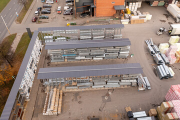 Drone photography of construction material outdoor shop during autumn day