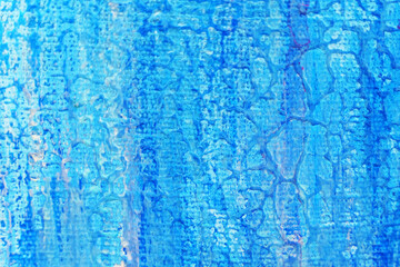 Texture of canvas painted blue with veins.