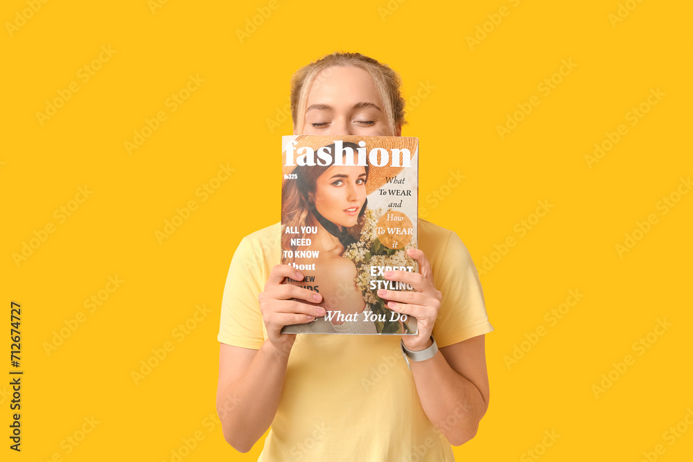 Sticker beautiful happy young woman with magazine laughing on yellow background