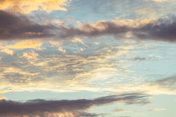 Fototapeta na wymiar Orange Clouds and Blue Sky, Sunset Sky Copy Space