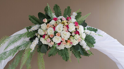 Wedding arch decor  flowers garland bouquet with artificial plants and flowers including white and pink roses and tropical green leaves