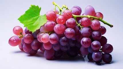 Close-up of clusters of grapes on a light-colored dish