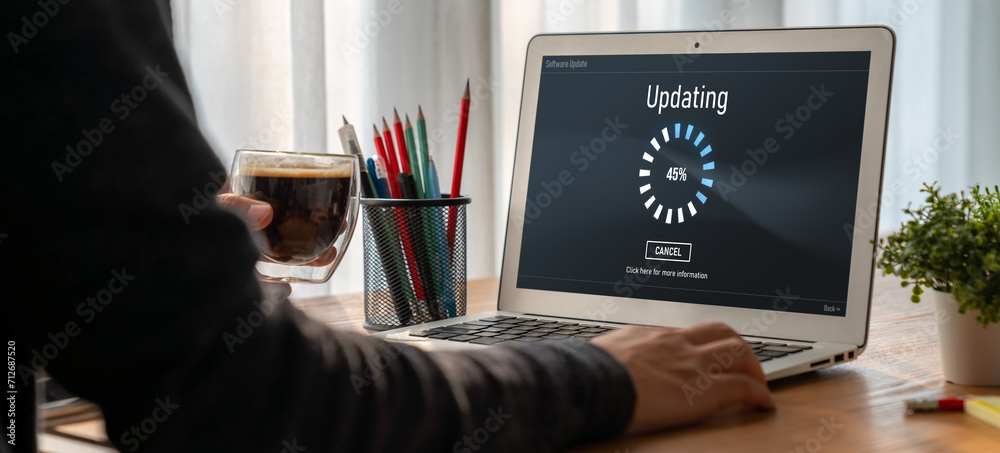 Poster software update on computer for modish version of device software upgrade