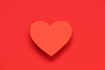 Paper heart on red background. Valentine's day celebration