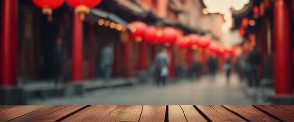 Woodenempty rustic street tabletop with a blurred background of vibrant red Chinese lanterns