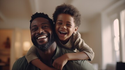 Happy black father and son playing on blurred background of living room - obrazy, fototapety, plakaty