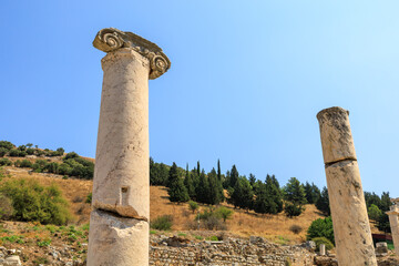 Ruins of ancient columns. Background with selective focus and copy space