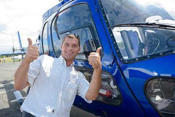 happy helicopter pilot with licences