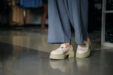 A persons legs and shoe 5761s.
